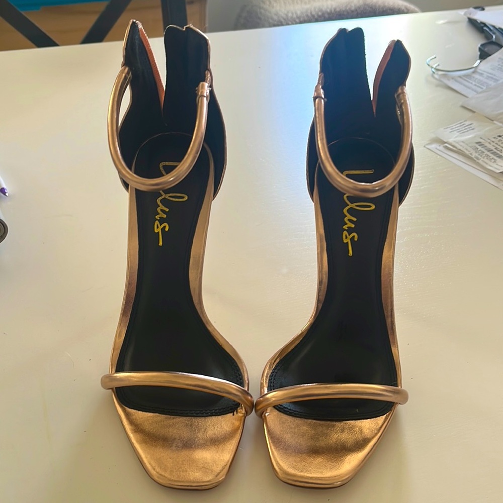 Rose gold shine sandals great for a party on going out . I wore them once